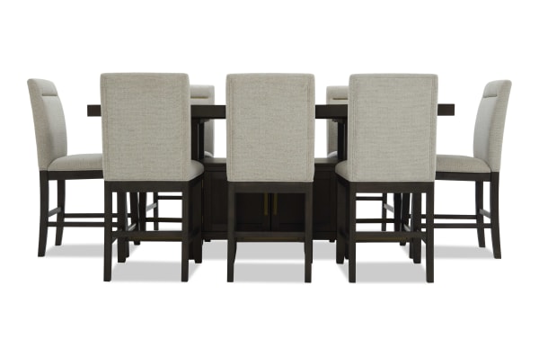 Encore 9 Piece Brown & Beige Upholstered Extendable Storage Counter Height Dining Set with beige polyester fabric, MDF/acacia veneers, and memory foam stools.