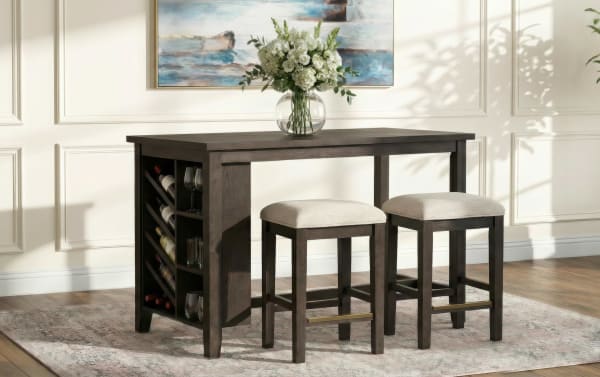 Dark wood bar table with built-in wine rack and two beige cushioned stools, styled with a glass vase of white flowers on top.