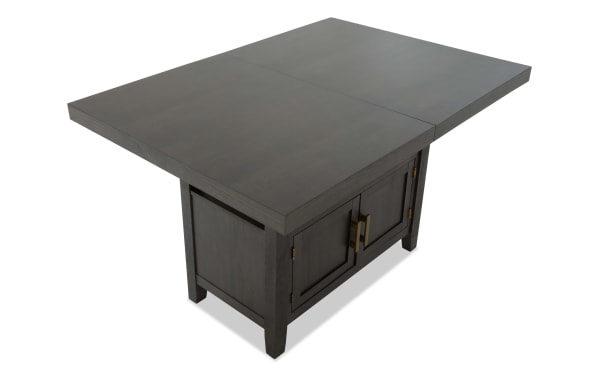 Encore Brown Counter Height Extendable Storage Dining Table in contemporary style with MDF and Acacia veneers, featuring a dark brown finish and cabinet storage.