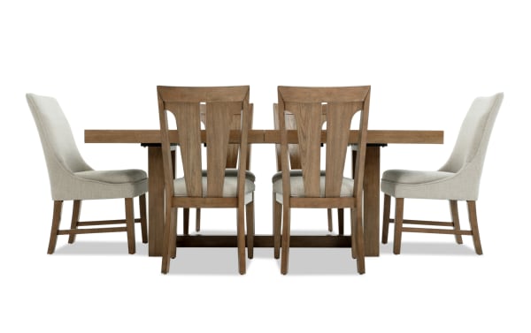 Melrose 7 Piece Natural & Beige Upholstered Extendable Dining Set with rectangular rubberwood table and beige polyester fabric chairs.