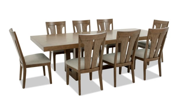 Melrose 9 Piece Natural & Beige Slat Back Extendable Dining Set with rectangular rubberwood table, beige polyester fabric chairs, and memory foam cushions.