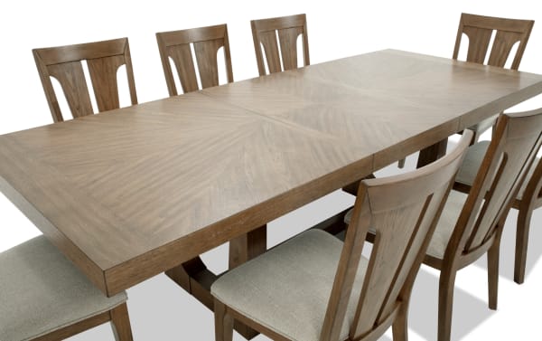 Melrose 9 Piece Natural & Beige Slat Back Extendable Dining Set with rectangular wood table, beige polyester fabric chairs, transitional style, and memory foam seats.