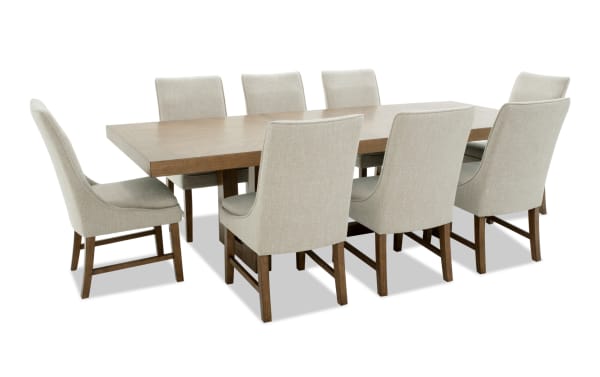 Melrose 9 Piece Beige Transitional Dining Set with extendable solid back chairs, polyester fabric upholstery, and natural wood table with hidden leaf storage.