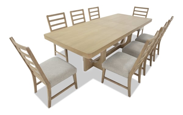 Malibu 9 Piece Natural & Gray Extendable Dining Set with solid acacia wood table and gray polyester fabric chairs featuring memory foam cushions.