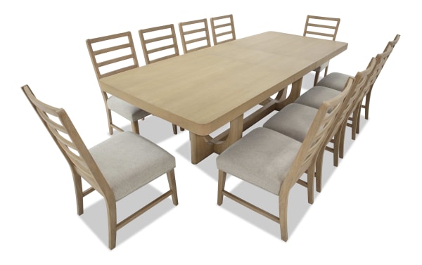 Malibu 11 Piece Natural & Gray Extendable Dining Set with solid acacia wood table and gray polyester fabric chairs featuring memory foam cushions.