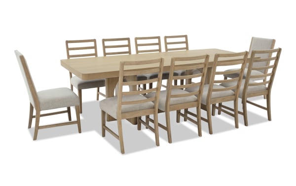 Malibu 11 Piece Natural & Gray Extendable Dining Set with solid acacia wood table and gray polyester fabric chairs featuring memory foam cushions.