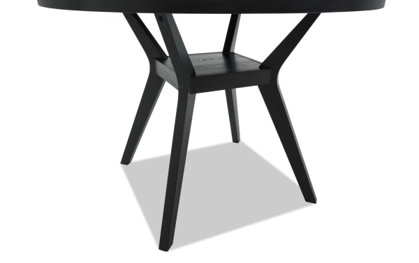 Black wooden table legs with a modern, angled design and a square support shelf, showcasing sturdy construction and minimalist style.