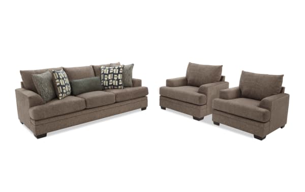 Brown fabric living room set with a three-seater sofa and two matching armchairs, featuring cushioned seats and patterned throw pillows.