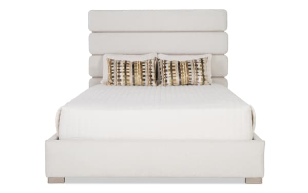 Delray 4 Piece Queen White Upholstered Panel Bedroom Set featuring a white polyester fabric bed with a contemporary padded panel headboard and clean lines.