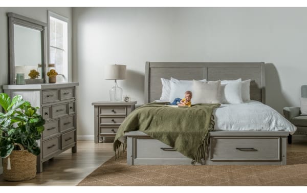 Hudson Full Gray Storage Platform Bed from Hudson Bedroom collection, transitional style with rubberwood, pine solids, mango veneer. Features paneled sleigh headboard, six spacious storage drawers, pewter hardware, and rustic gray finish. Includes matching nightstand and dresser with mirror.