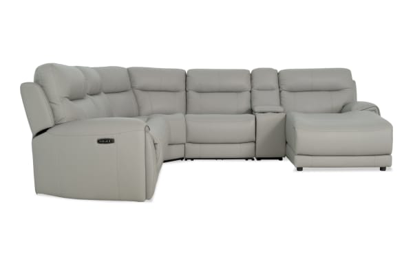 Gray Illusion transitional 129" leather sectional with power reclining seats, right arm chaise, power headrests, USB ports, cup holders, and drop-down table.