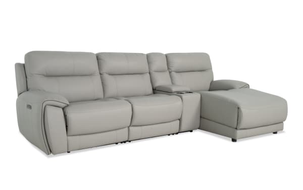Illusion Gray Leather 122" power reclining sectional with right-arm chaise, armless chair, power headrests, USB ports, cupholders, and drop-down table.