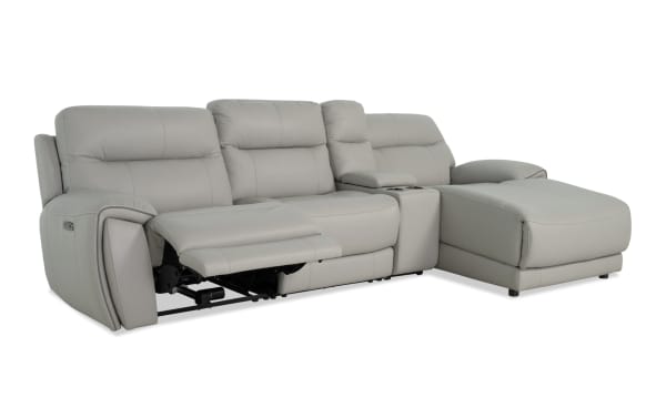 Illusion Gray Leather 122" power reclining sectional with right arm chaise, armless chair, USB ports, wireless charging, cupholders, and memory foam cushions.