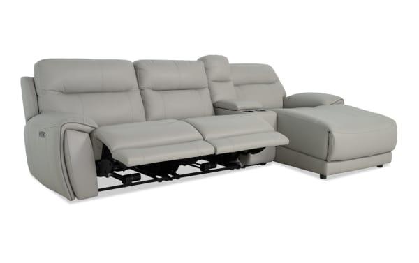 Illusion Gray Leather 122" power reclining 4-piece sectional with right arm chaise, armless power recliner, power headrest, USB ports, and cupholders.