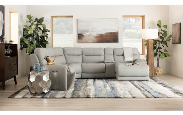 Illusion Gray Leather 110'' power reclining sectional with right arm chaise, armless power recliner, power headrest, USB ports, cup holders, transitional style.