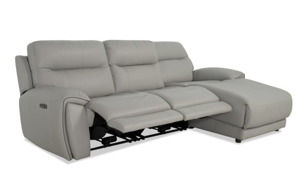 Illusion Gray Leather 110'' power reclining sectional with right arm chaise, armless power recliner, and power headrest in transitional gray leather.
