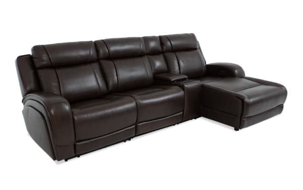 Tracker Brown Leather 121'' power reclining sectional with right arm chaise, armless chair, USB ports, wireless charging, and memory foam cushions.