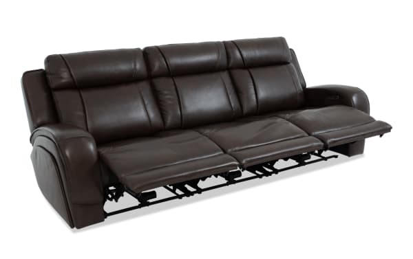 Tracker Brown Leather 108'' power reclining sofa with armless power recliner, power headrest, brown leather upholstery, and contemporary style.