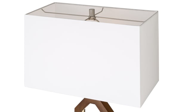 Rectangular white fabric lampshade with a wooden tripod base, featuring a modern, minimalist design suitable for home or office lighting.