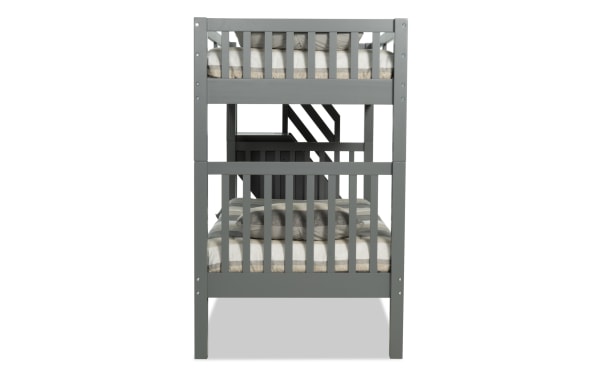 Chadwick Twin/Twin gray stairway bunk bed with two mattresses, solid pine construction, transitional style, built-in storage stairs, versatile setup.