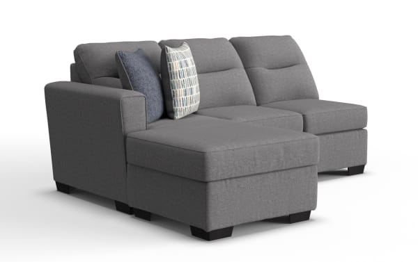 Dylan Slate Left Arm Facing Sofa & Chaise Kit in gray polyester fabric, transitional style with memory foam cushions, featuring a left chaise and two decorative pillows.