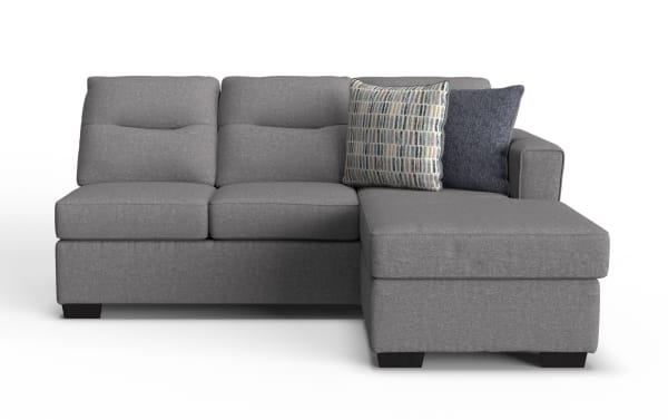 Dylan Slate Right Arm Facing Sofa & Chaise Kit in gray polyester fabric, transitional style with memory foam cushions, featuring two patterned throw pillows.
