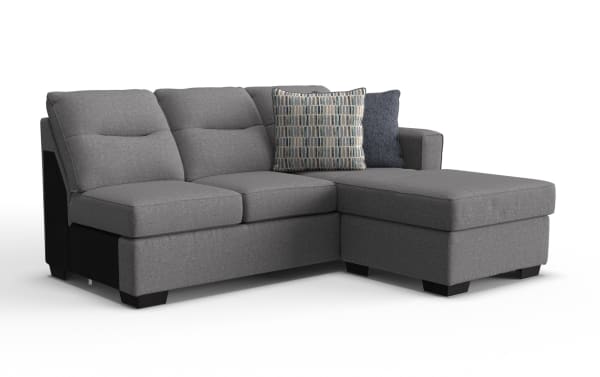 Dylan Slate Right Arm Facing Sofa & Chaise Kit in gray polyester fabric, transitional style with memory foam cushions, featuring a right chaise and two patterned throw pillows.