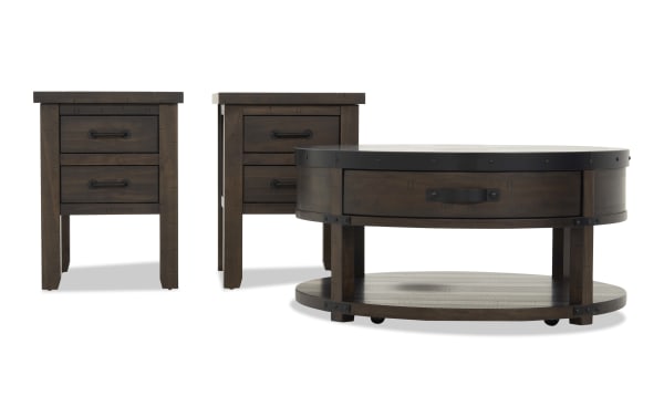 Set of dark brown wooden rustic furniture including two square nightstands with two drawers and black metal handles, and one round coffee table with a lower shelf and black metal accents.