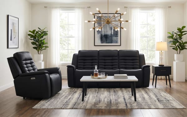 Raptor Black Leather 87" power reclining sofa and recliner set in black leather, contemporary style with tufted cushions, power headrest, and lumbar support.