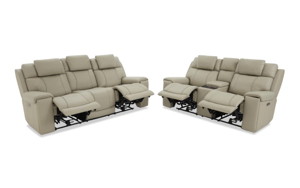 Beige leather reclining sectional sofa set with plush cushioned seats, adjustable footrests, and headrests, designed for modern living rooms.