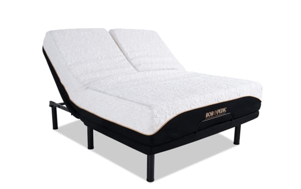 Adjustable split king bed base with white patterned mattress, black fabric sides, and "BOBOPEDIC" branding, designed for customizable comfort.