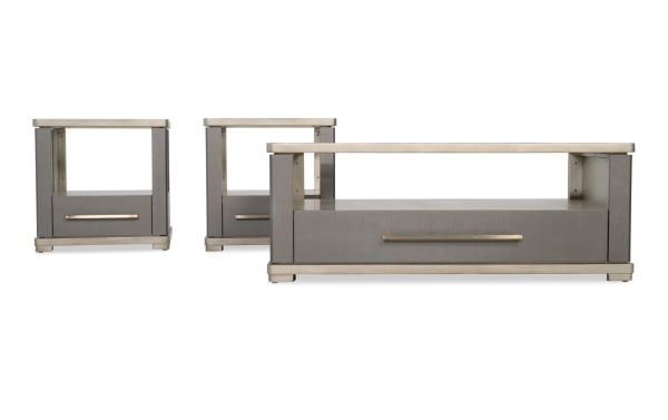 Set of three modern gray and beige wooden tables, including two square side tables with drawers and one rectangular coffee table, featuring metal handles and open shelf design.