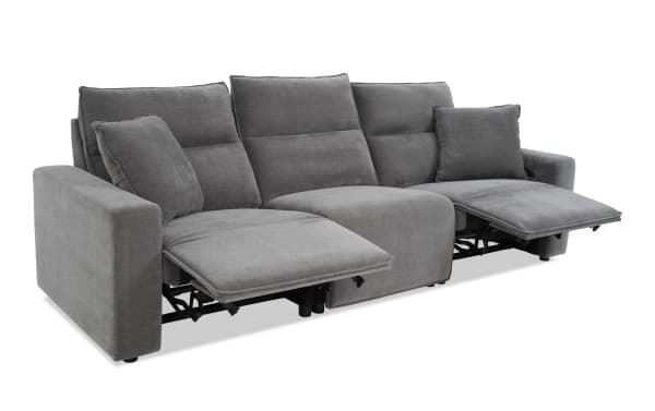 Gray fabric reclining sectional sofa with padded armrests, adjustable footrests, and multiple cushions for enhanced comfort and modern living room use.