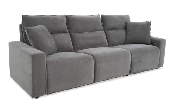 Modern gray fabric three-seater sofa with plush cushions, padded armrests, and a soft, textured upholstery ideal for living room comfort.