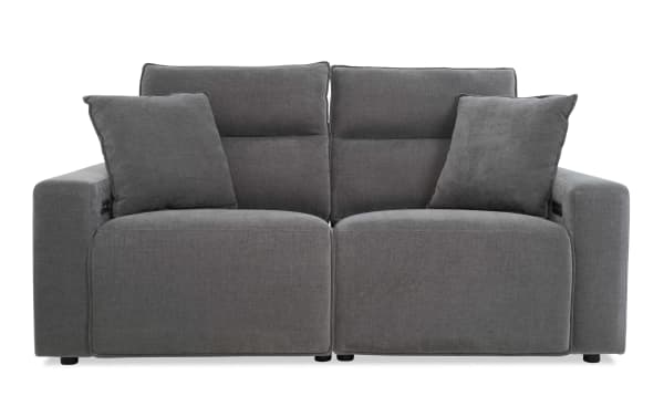 Modern gray fabric loveseat sofa with plush cushions and wide armrests, designed for comfortable two-person seating in living rooms.