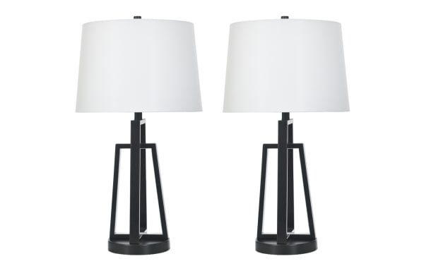 Pair of modern black metal table lamps with open geometric bases and white fabric drum shades, ideal for contemporary home decor.