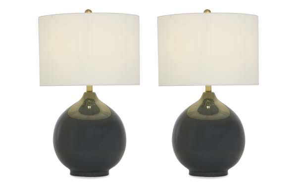 Pair of modern table lamps with glossy dark gray ceramic round bases, brass accents, and white drum fabric shades, ideal for living room decor.