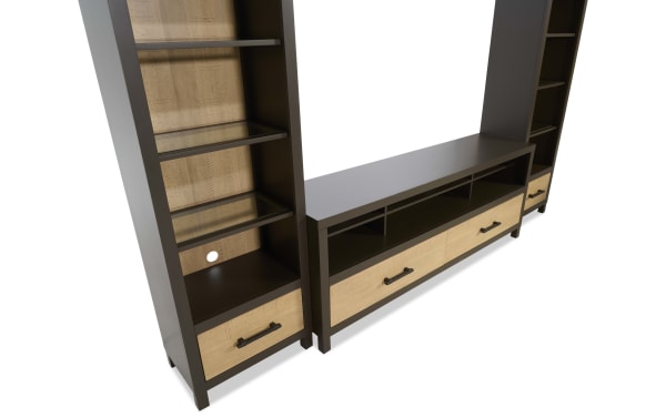 Modern black and natural wood TV entertainment center with open shelves, drawers, and cable management holes for organized media storage.