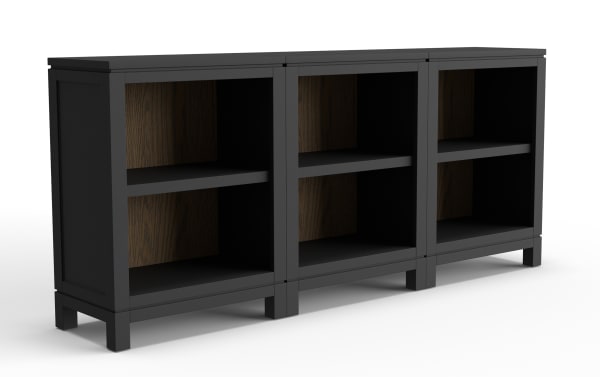Black wooden bookshelf with three sections, each featuring two open shelves and a dark wood grain back panel, modern storage furniture.