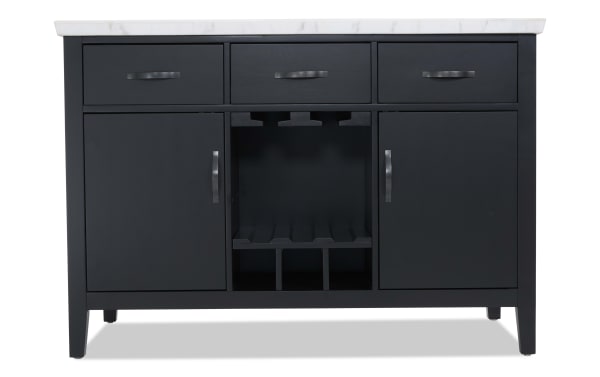 Black wooden kitchen island with white marble countertop, three drawers, two cabinets, and central wine rack storage.