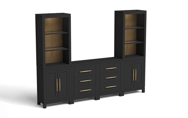 Black wooden storage cabinet with gold handles, featuring two tall open shelves with wood grain back panels, and six drawers in the center.