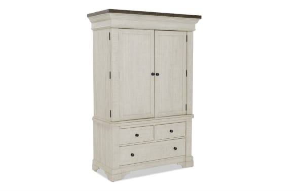Whitewashed wooden armoire with dark wood top, two doors, and three drawers, featuring black round knobs and classic molding details.