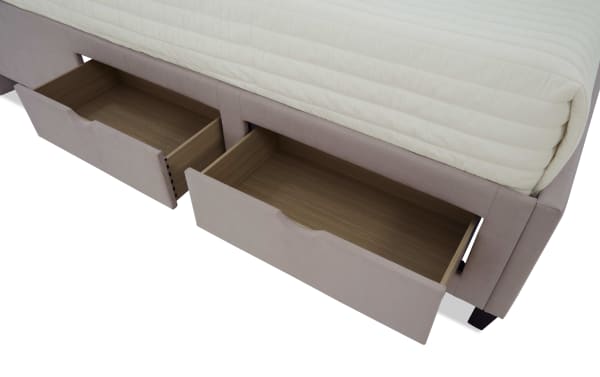 Bed frame storage drawers in beige fabric with wooden interiors, designed for under-bed organization and space-saving in bedroom furniture.