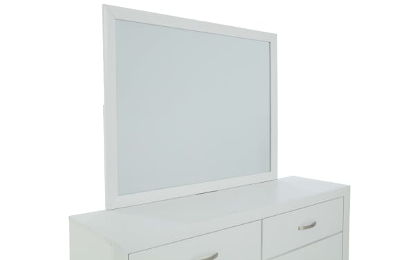White wooden dresser with four drawers and a large rectangular mirror framed in matching white wood, suitable for bedroom storage and decor.