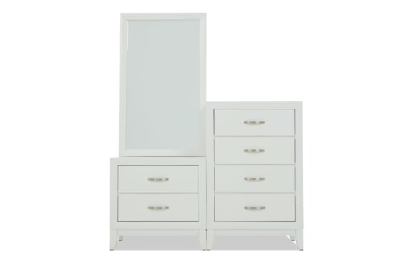 White modern dresser with a tall mirror on the left side and two drawers below it, paired with a four-drawer chest on the right, featuring sleek metal handles and a minimalist design.