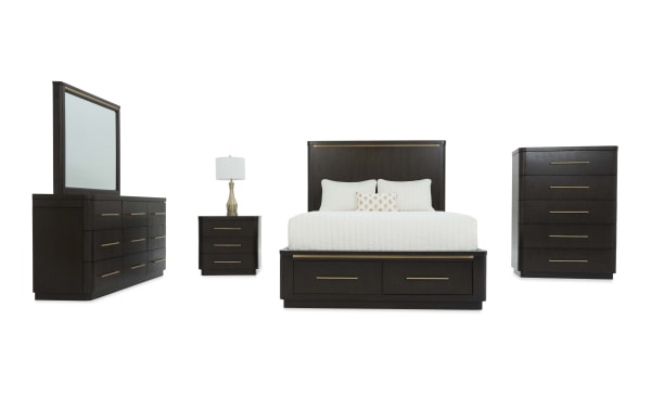 Dark wood bedroom furniture set including a bed with storage drawers, dresser with mirror, nightstand with lamp, and tall chest, featuring gold-tone handles and modern design.