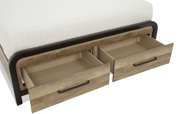 Wooden bed frame with two open under-bed storage drawers, featuring black metal handles and a white mattress on top.