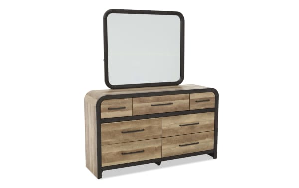 Wooden dresser with six drawers and three smaller top drawers, featuring black metal handles and frame, topped with a rectangular mirror with rounded black frame.