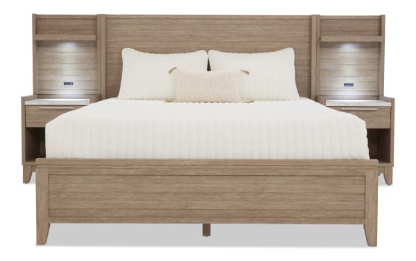 Modern wooden bed frame with integrated headboard and two matching nightstands, featuring built-in LED lights and white bedding.
