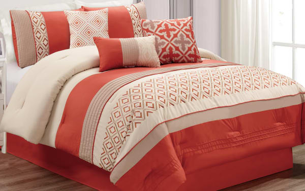 Marcella King 7 Piece Comforter Set in orange, white, and gold polyester fabric with geometric patterns, decorative pillows, and transitional style.